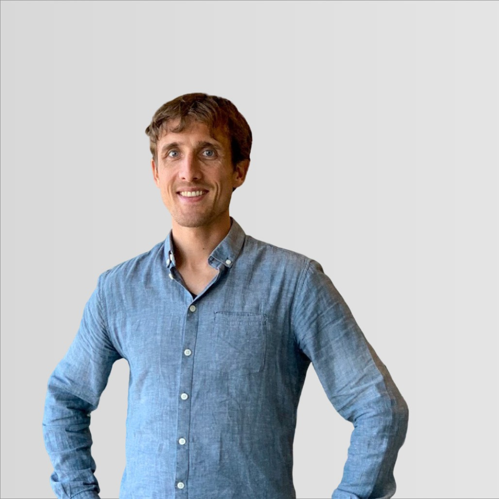 Welcome to our new Council members 2 Photo of a white man with short light brown hair. He's got his hands on his hips and he's wearing a pale blue collared shirt with the top buttons undone